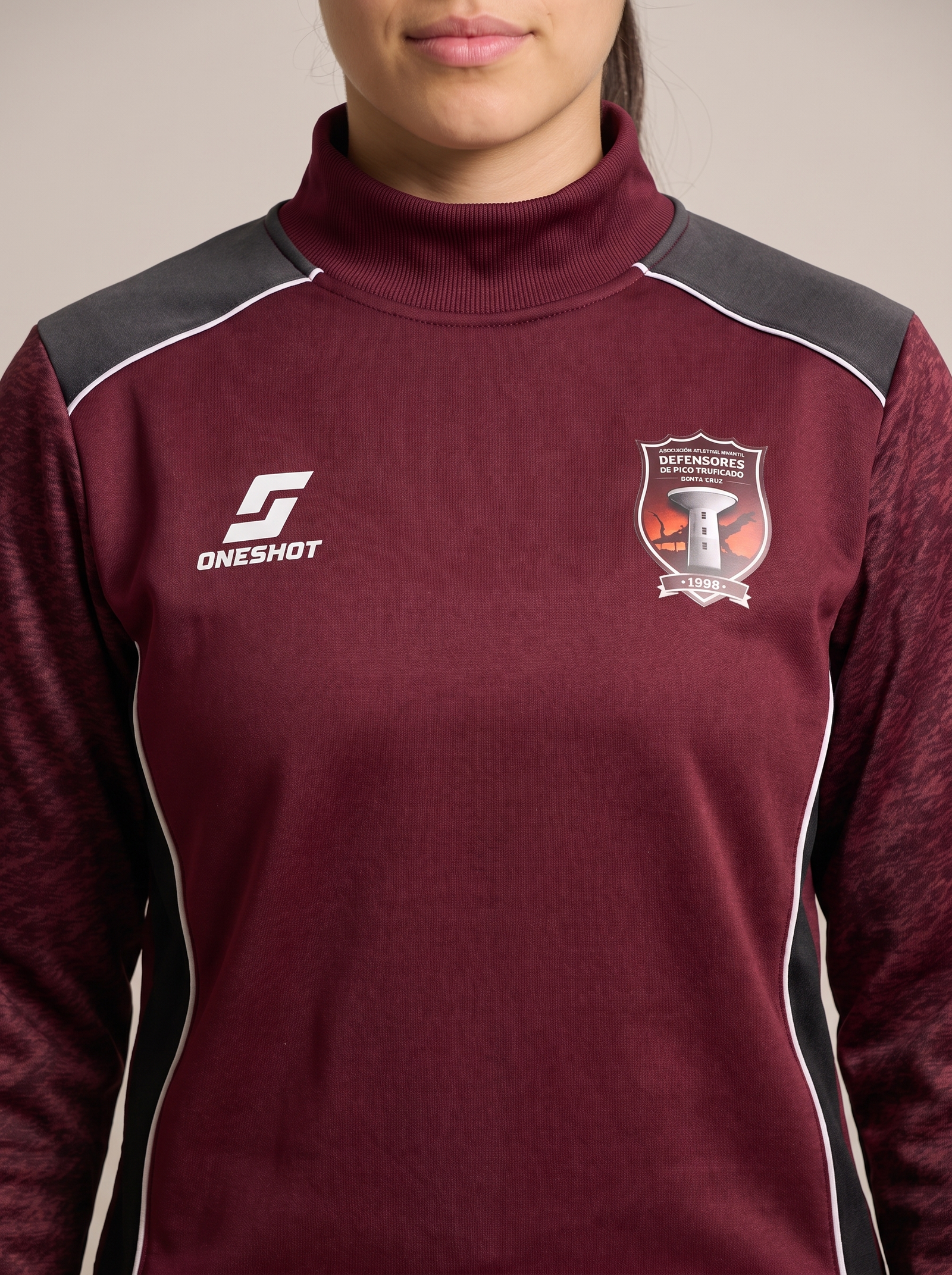 Conjunto de invierno femenino oficial 2026 de Defensores de Pico Truncado, detalle