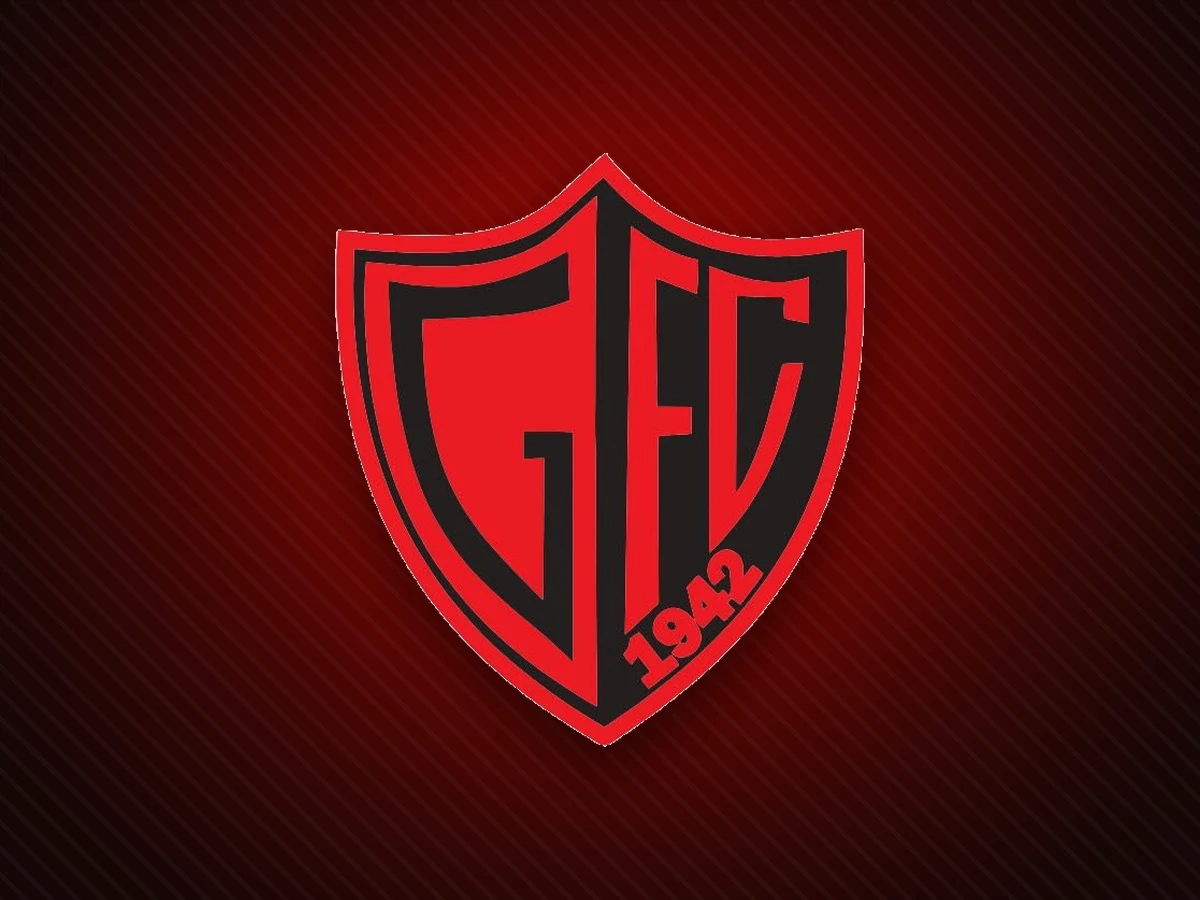 Escudo de Gaiman Fútbol Club sobre el rojo del club